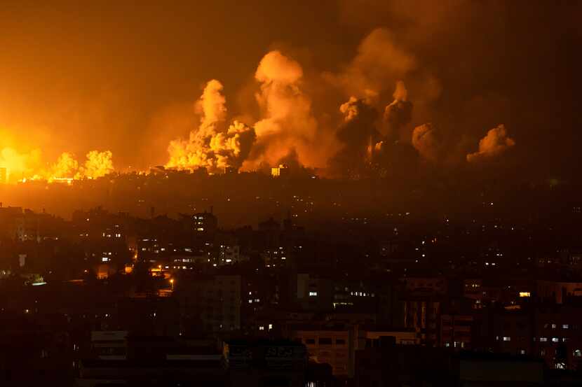 FILE - Fire and smoke rise following an Israeli airstrike in Gaza City, Sunday, Oct. 8,...