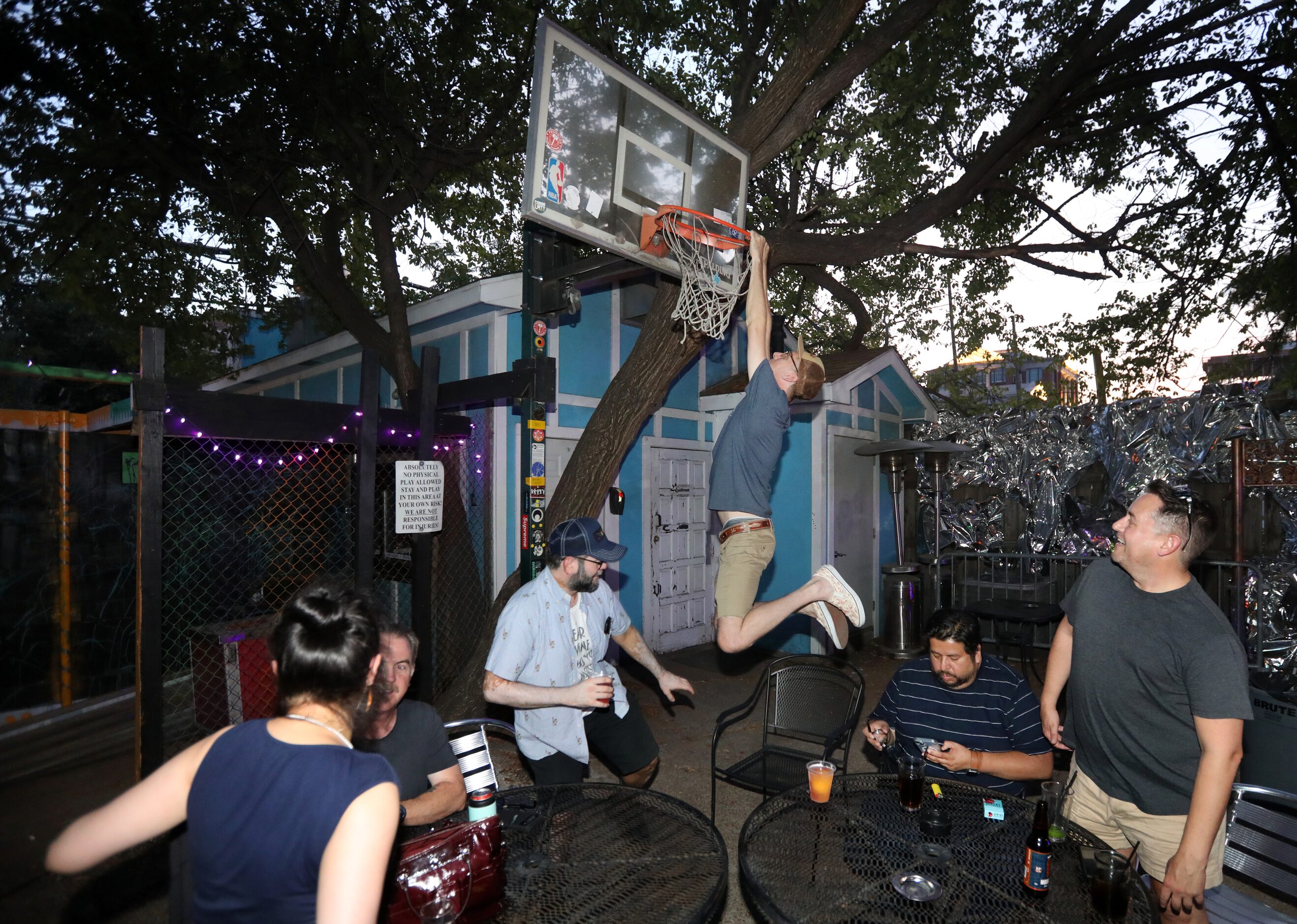 Guests enjoy one last evening at the Grapevine Bar in Dallas, TX, on Aug 23, 2023.  (Jason...