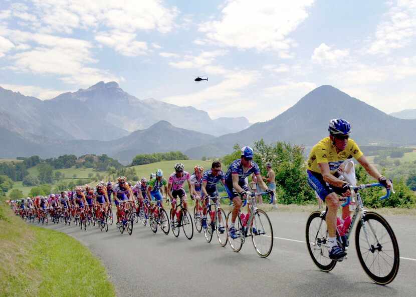 Lance Armstrong leads the pack outside Mens, French Alps, on the way to climb the Ponsonas...
