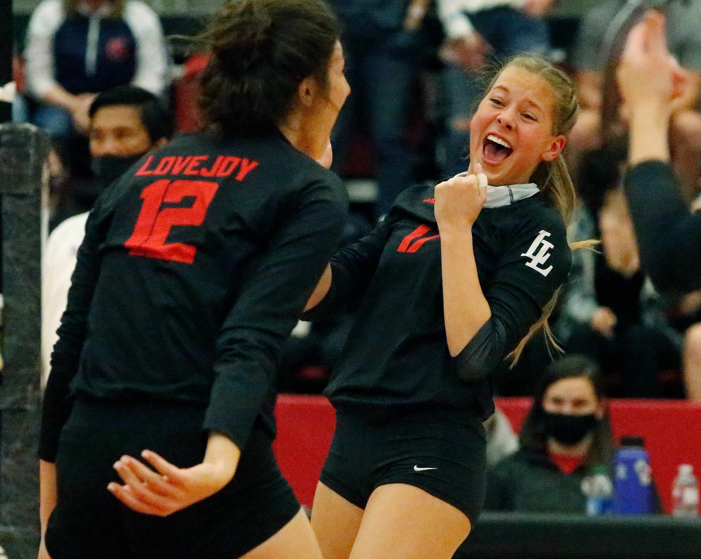 Lovejoy High School setter Rosemary Archer (17) and Lovejoy High School middle blocker...