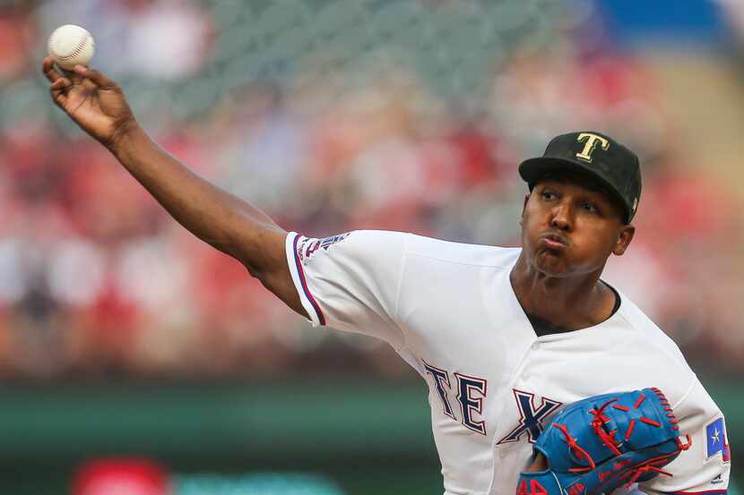 Texas Rangers starting pitcher Jose Leclerc (25) pitches during the top of the first inning...