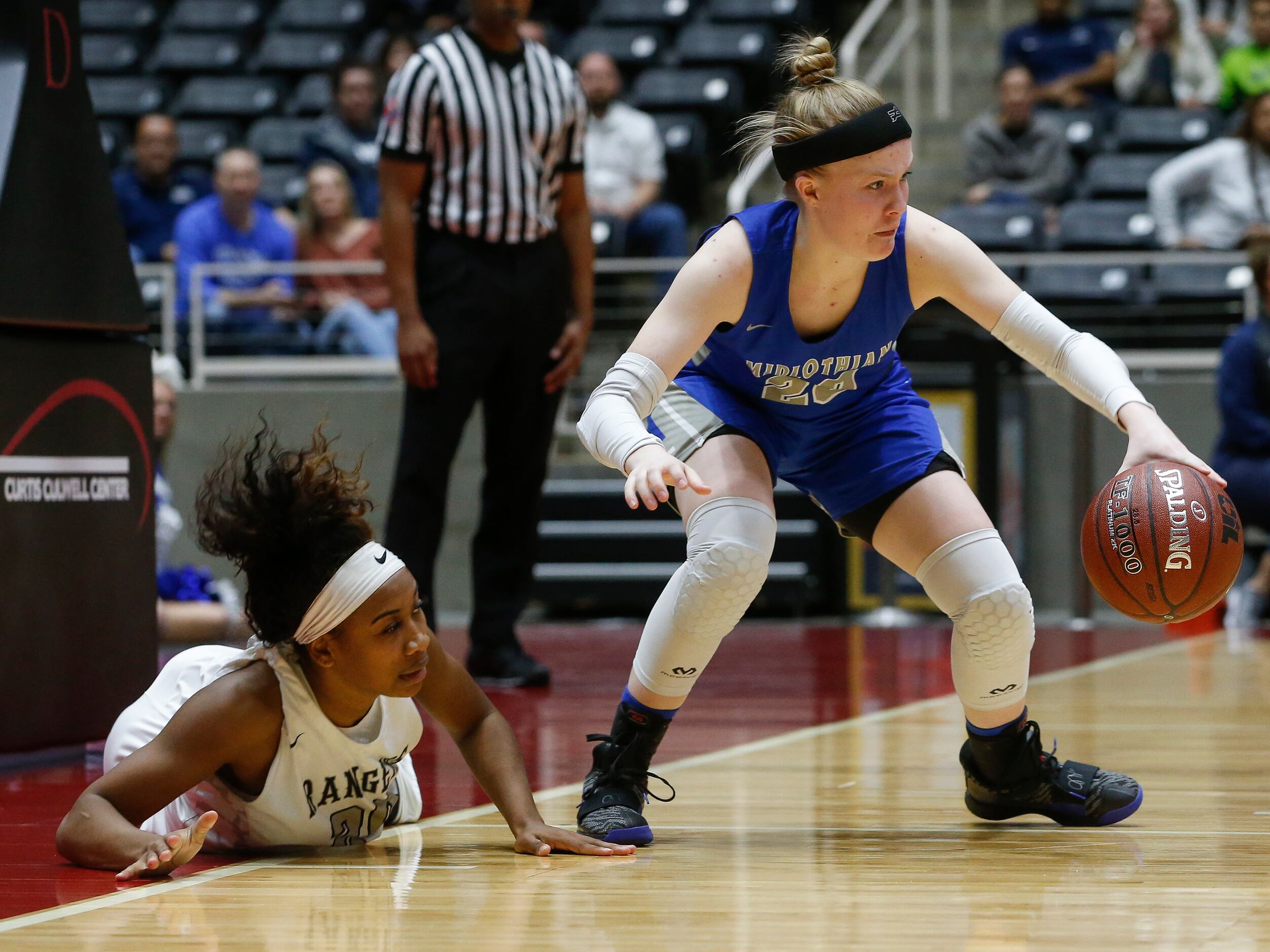 Midlothian's Hallie Mayfield (20), right, recovers a loose ball past Frisco Lone Star's...