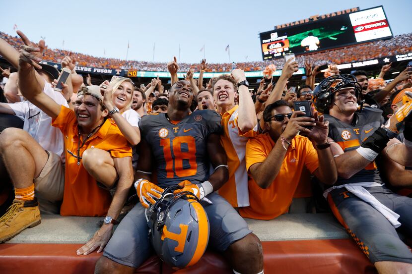 Jason Croom of the Tennessee Volunteers celebrates with fans after the Vols defeated the...