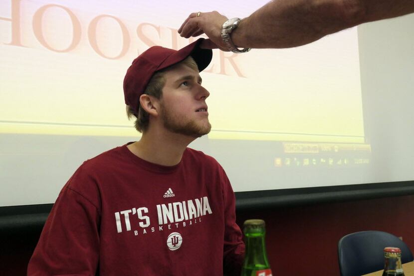 An Indiana University ball cap is placed on Richland High School basketball player Tim...