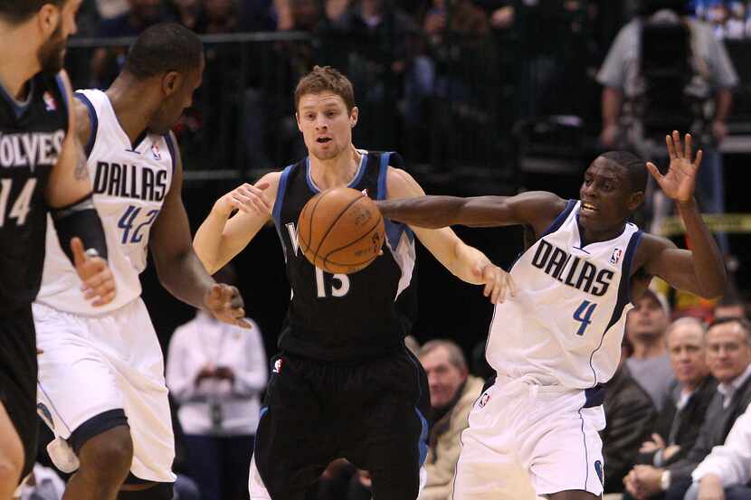 Dallas Mavericks point guard Darren Collison (4) tries to make a play on a loose ball...