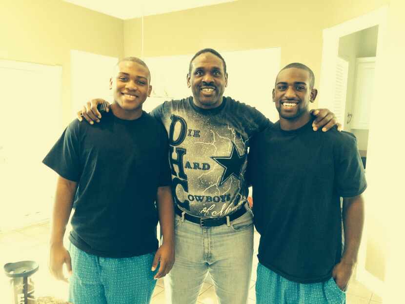 Former Cowboys player Nate Newton with his sons King (left) and Tre'.