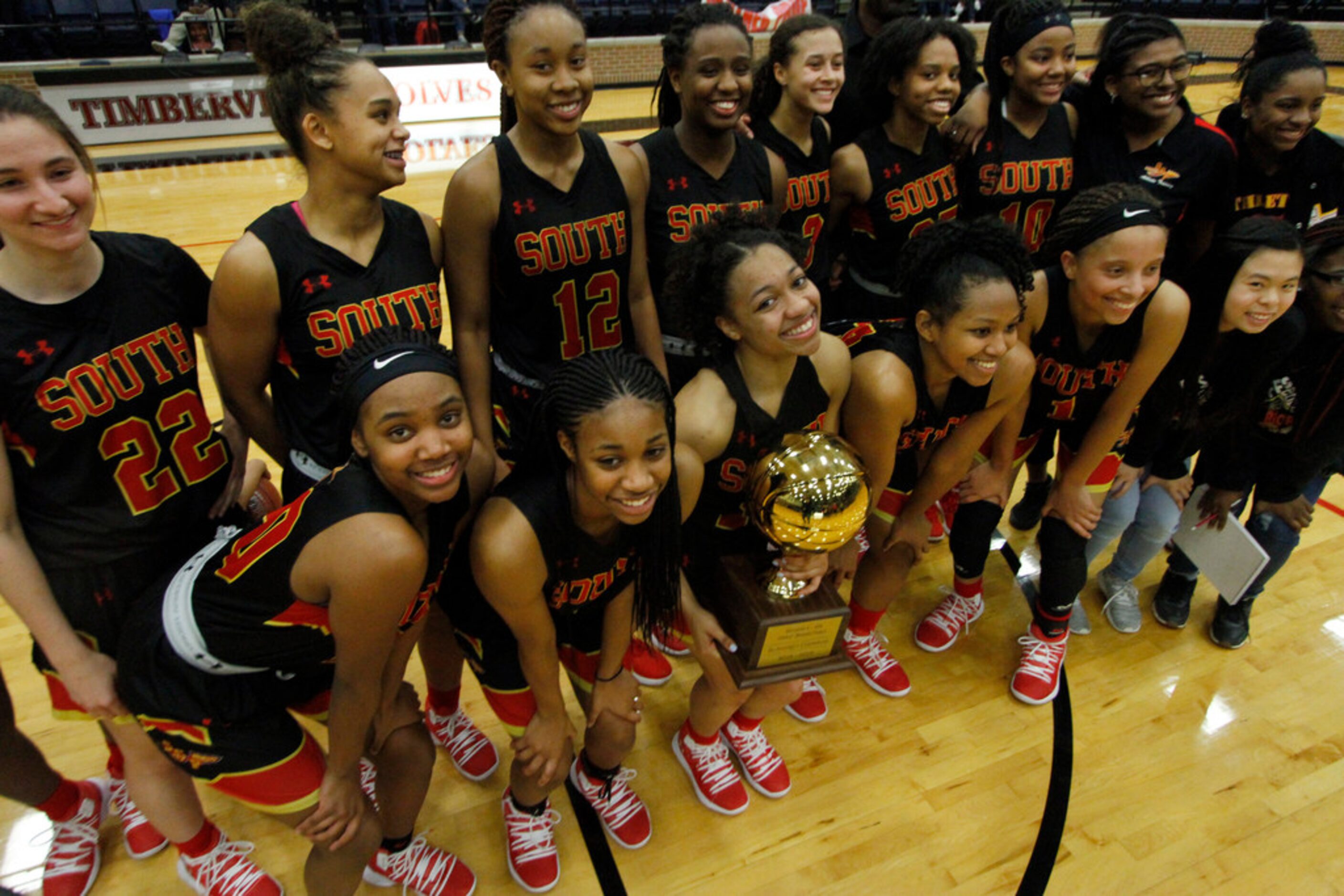 Sporting a smile almost as big as the Bi-District trophy she was holding, South Grand...