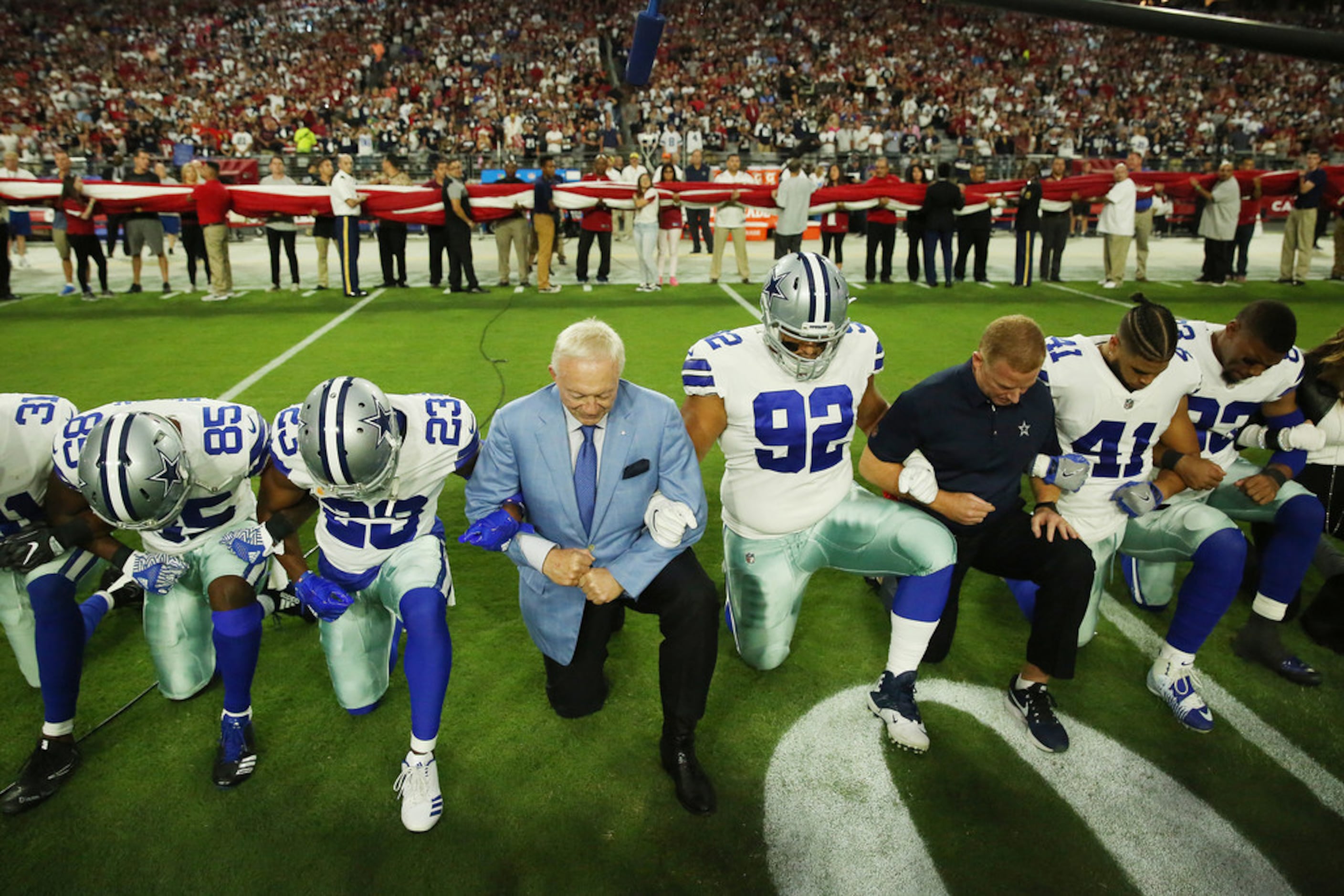 Cowboys owner Jerry Jones declines to comment on leaving his hat on during  national anthem