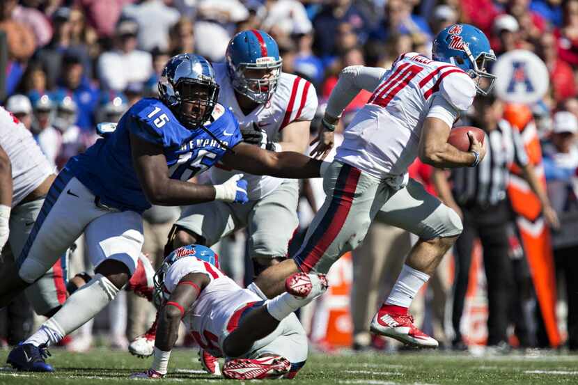 MEMPHIS, TN - OCTOBER 17:  Chad Kelly #10 of the Ole Miss Rebels runs out of a attempted...