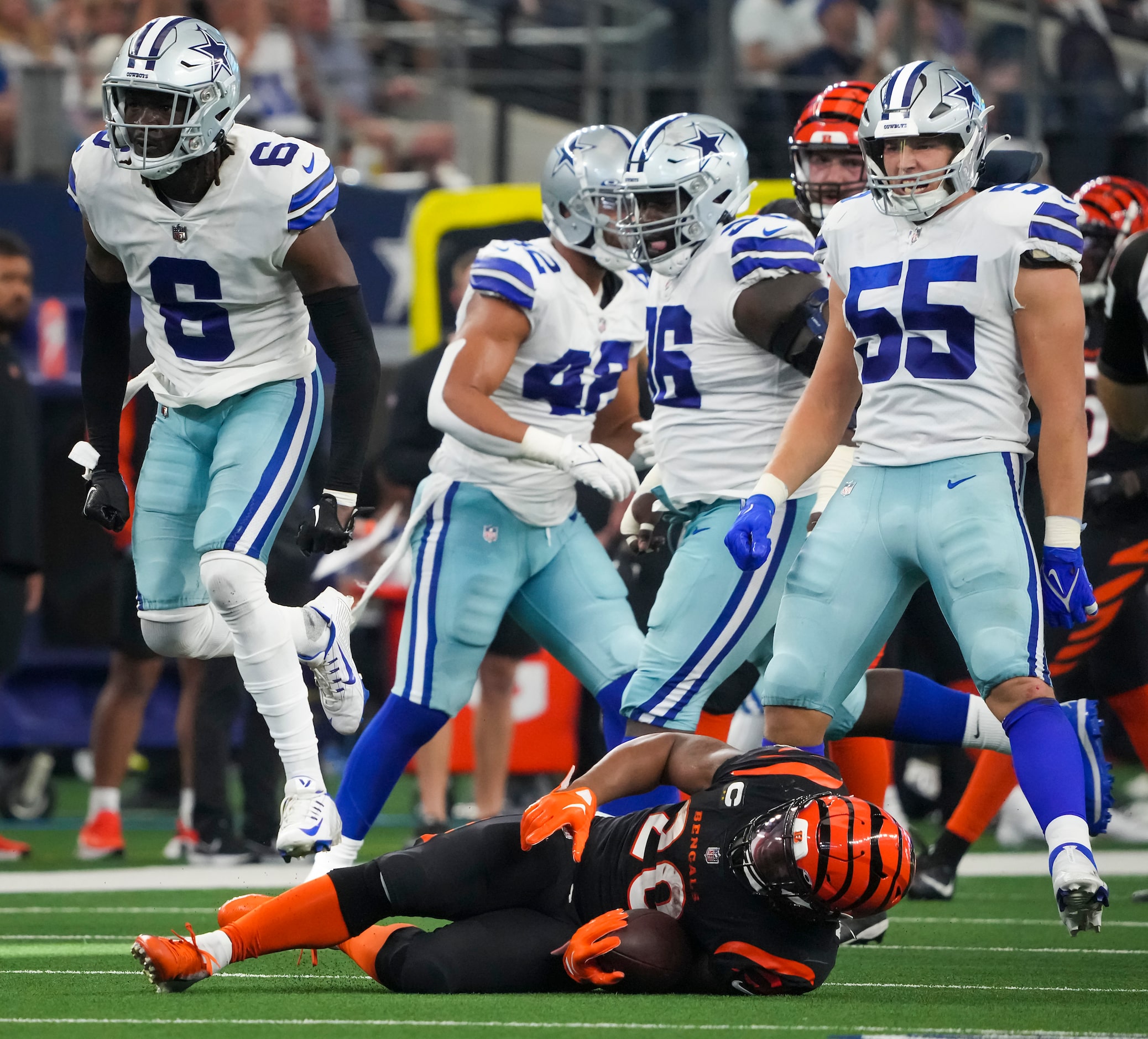 Dallas Cowboys safety Donovan Wilson (6) celebrates after dropping Cincinnati Bengals...