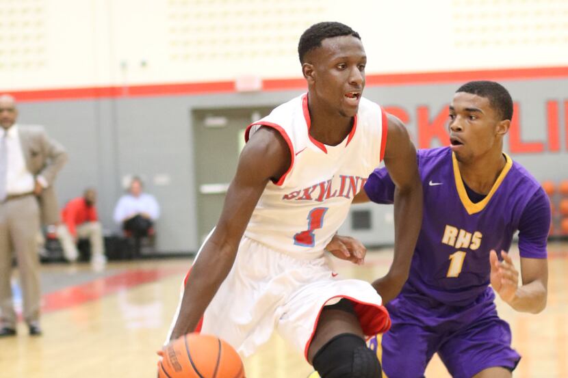 Skyline point guard Sammy Brooks (1) drives to the basket as he is defended by Richardson...