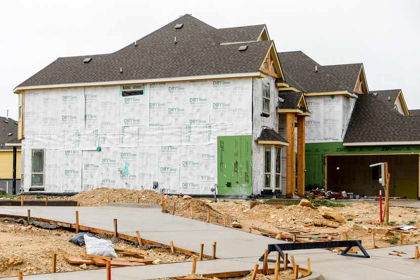 Construction continues on homes along Crestview Drive in Midlothian.