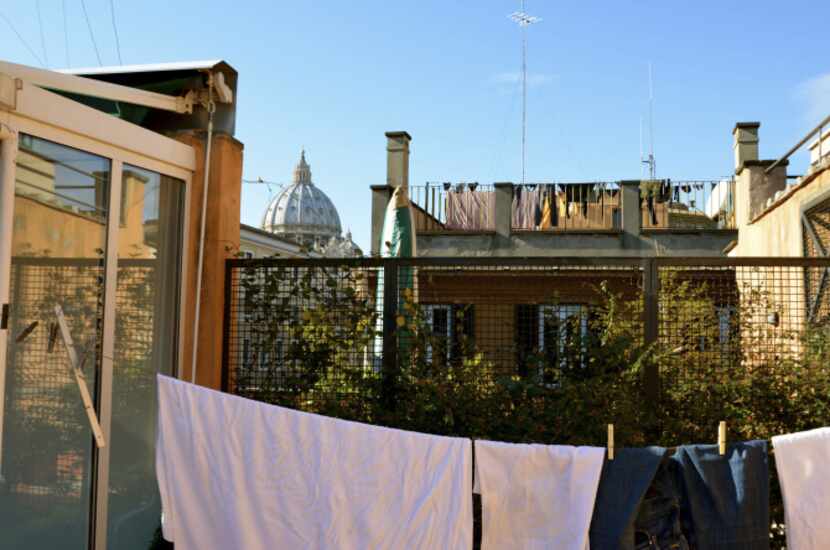 On fine days, Elizabeth Knight dries her laundry on her terrace. In the distance is St....