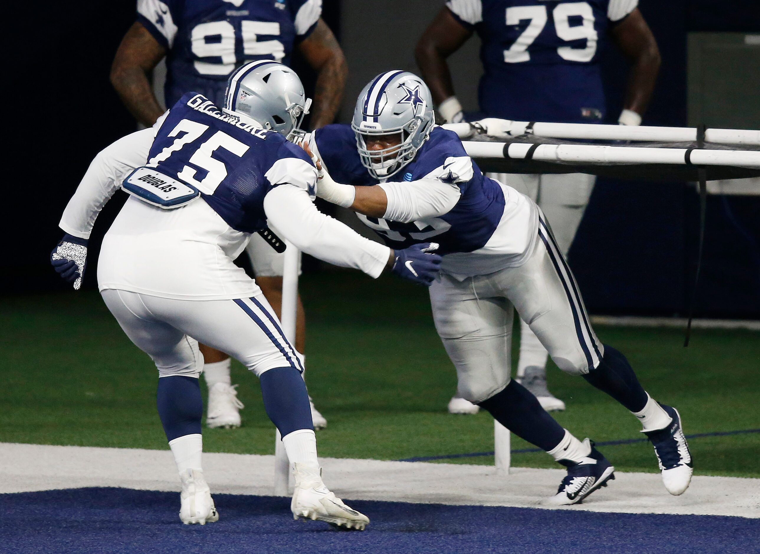 Dallas Cowboys defensive tackle Gerald McCoy (93) runs through a drill with Dallas Cowboys...