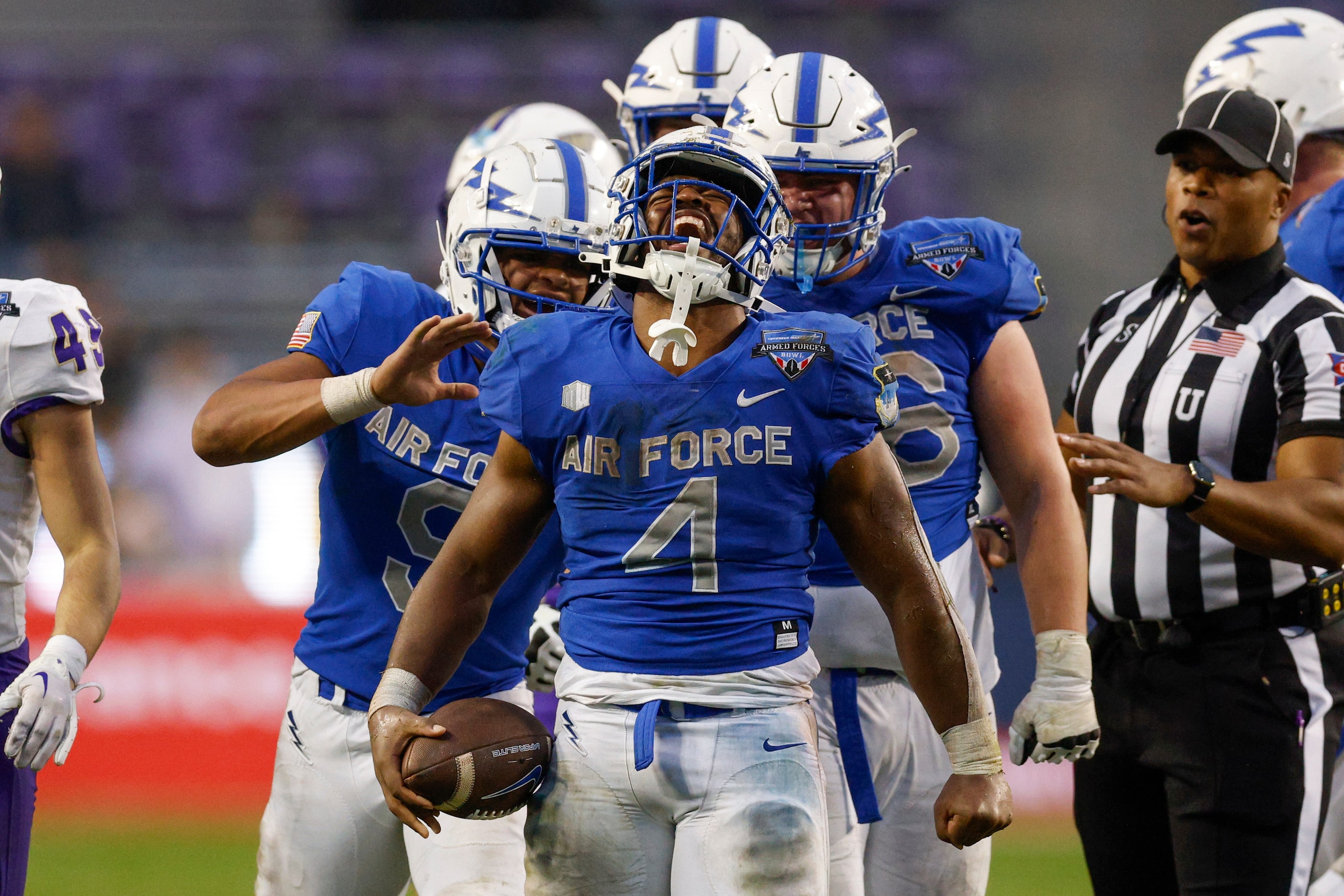 Air Force Falcons fullback Emmanuel Michel (4) celebrates a first down during the second...