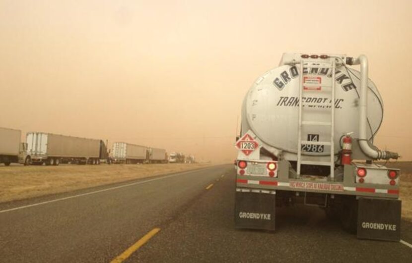 Blowing dust and wind speeds averaging 45 mph and gusting to 55 mph hampered drivers on...