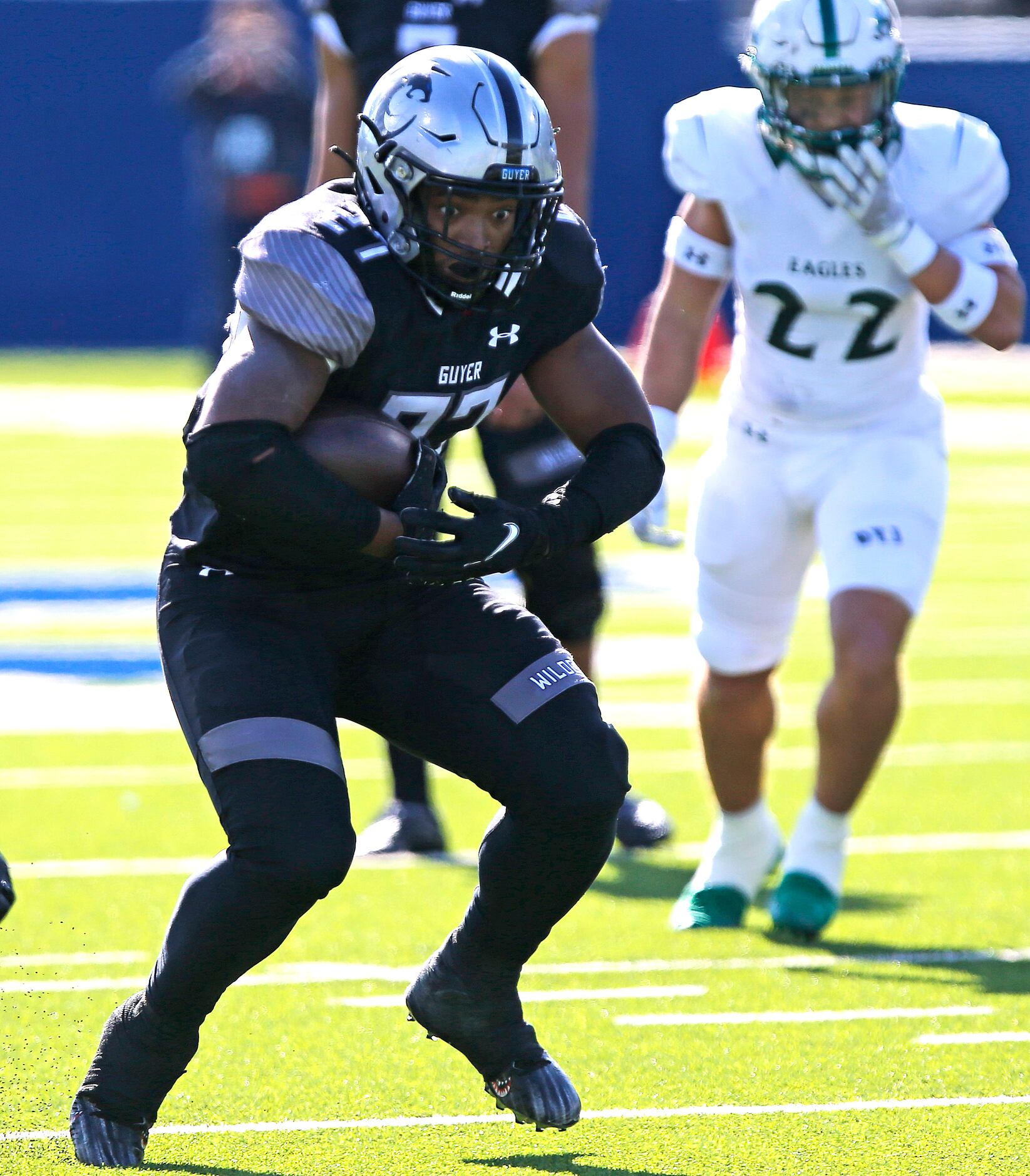 Denton Guyer High School running back Byron Phillips jr. (27) carries the football during...