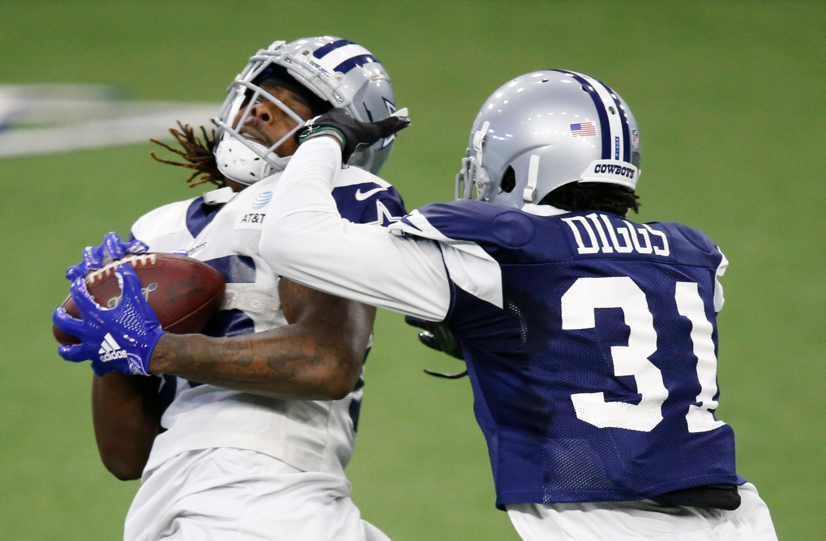 Dallas Cowboys wide receiver Noah Brown (85) is hit in the face as he is defended by Dallas...