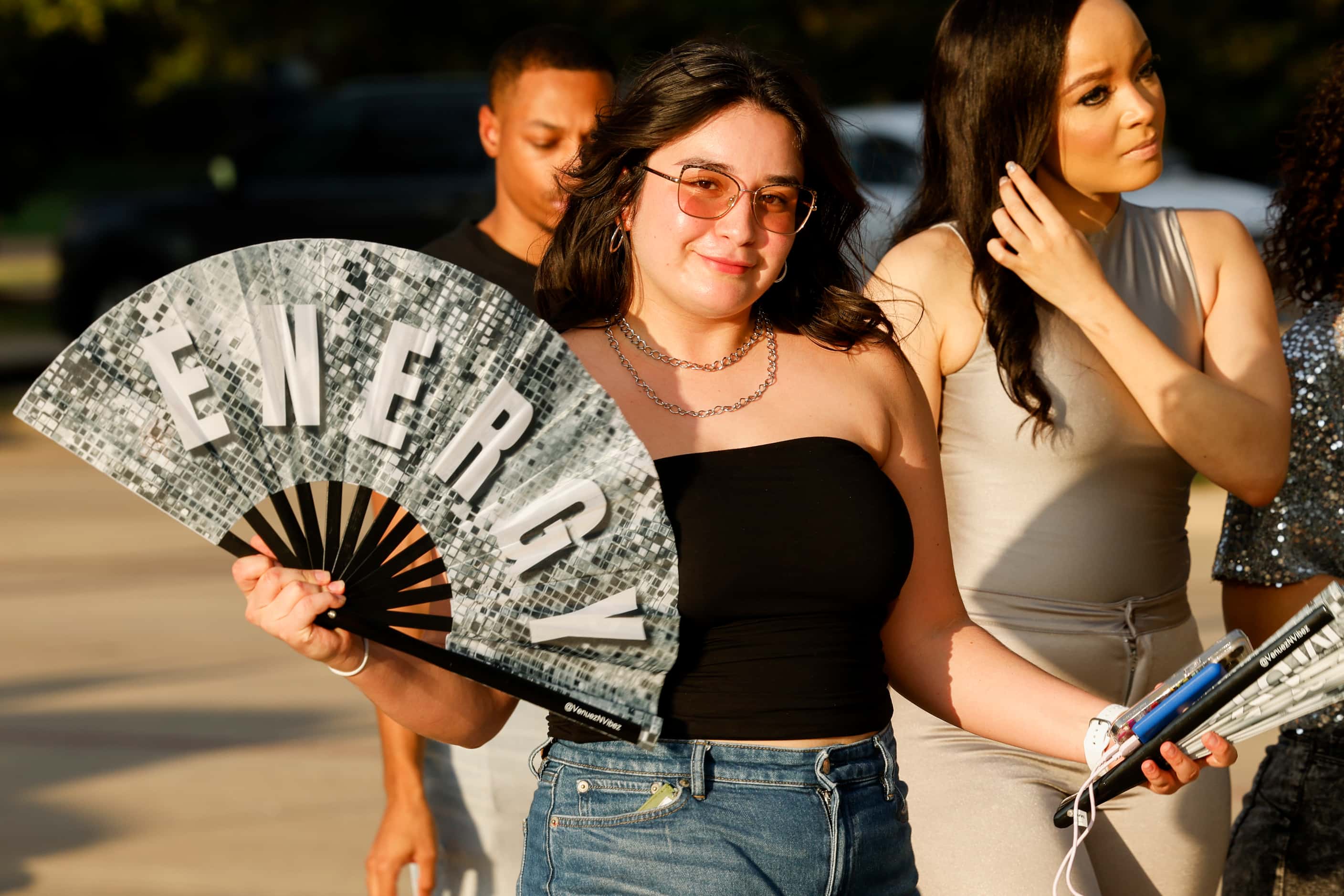 Ariel Hernandez tries to stay cool with her fan as she walks to Beyoncé’s Renaissance World...