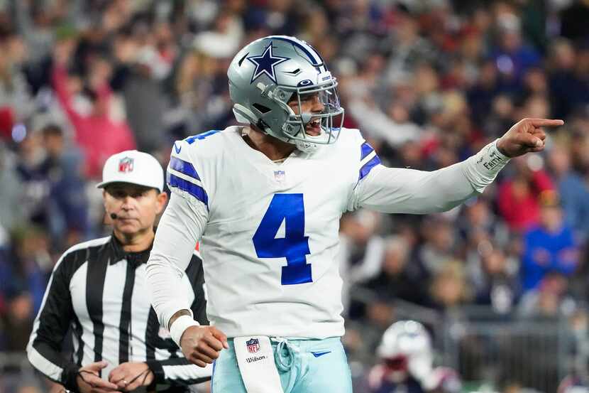 Dallas Cowboys quarterback Dak Prescott (celebrates after throwing a 1-yard touchdown  pass...