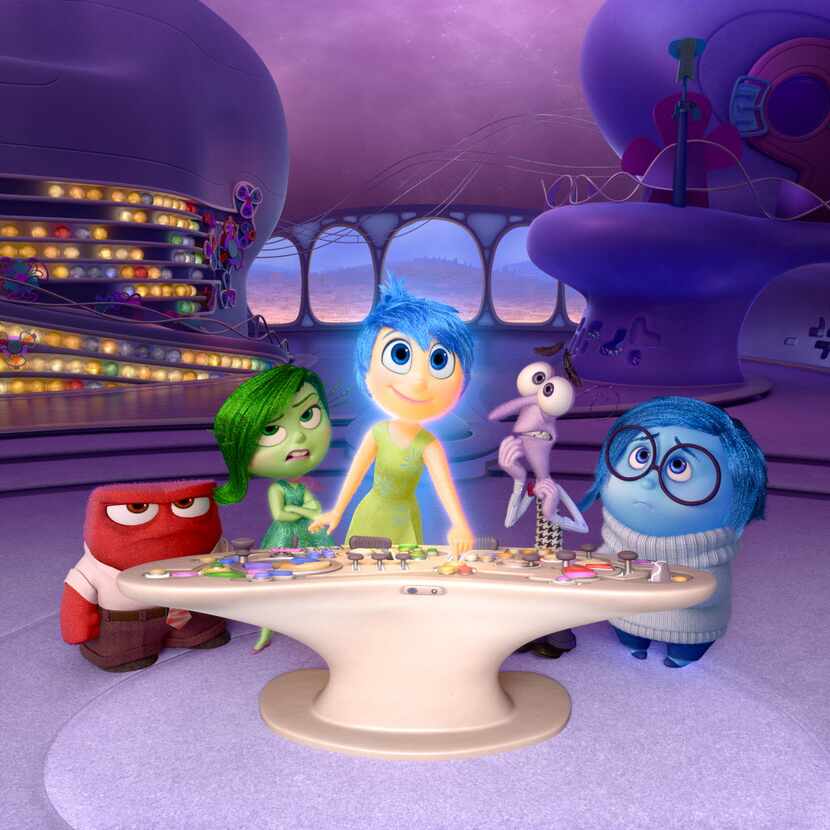 In this file image released by Disney-Pixar, characters, from left, Anger, voiced by Lewis...