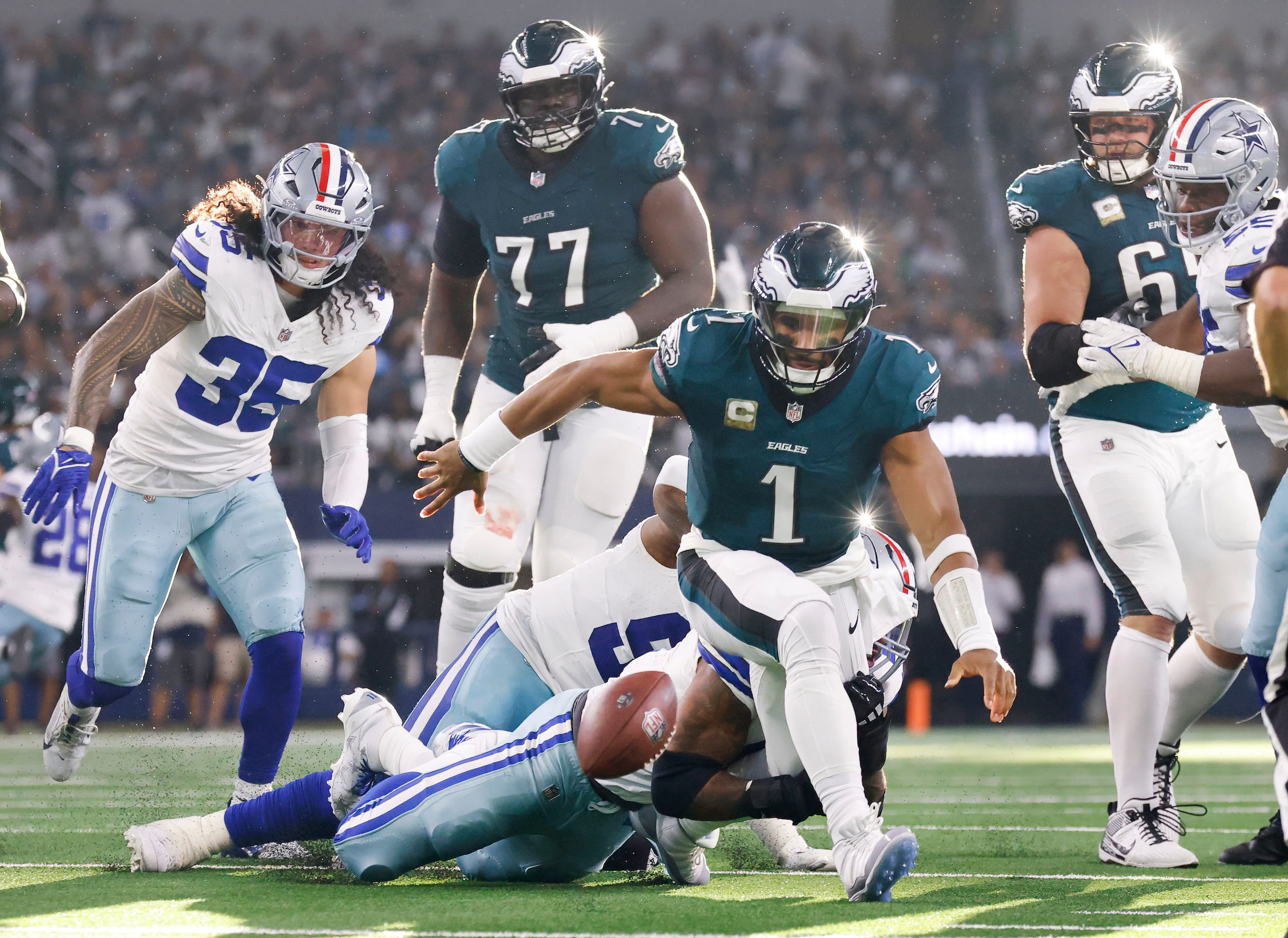 Dallas Cowboys linebacker Micah Parsons (11) forces Philadelphia Eagles quarterback Jalen...