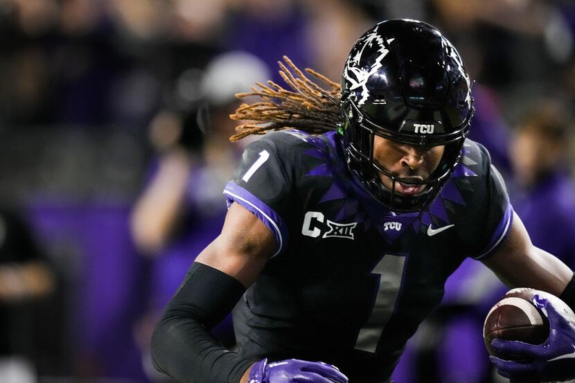 TCU wide receiver Quentin Johnston scores on a 55-yard touchdown reception during the second...