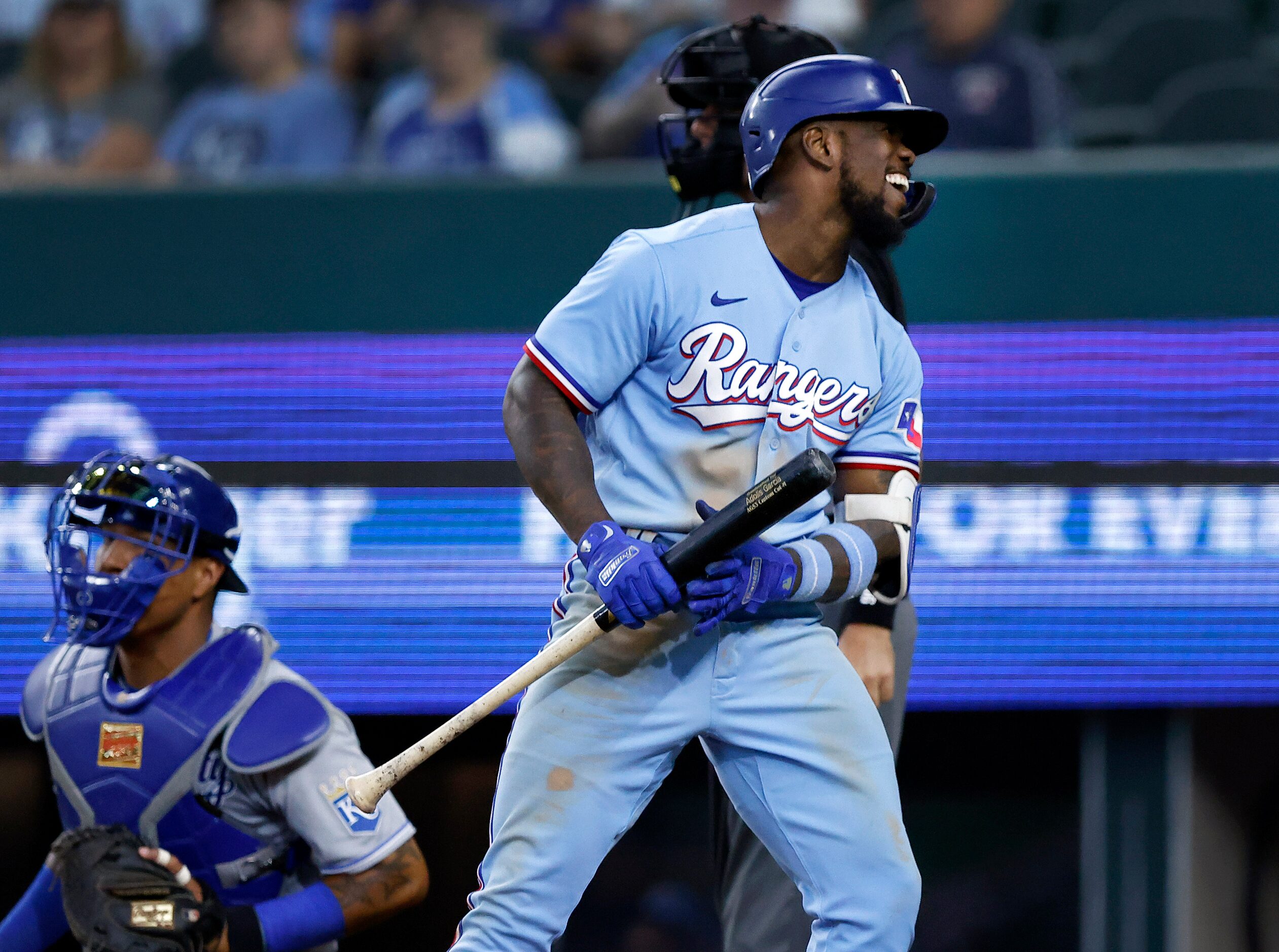 Texas Rangers batter Adolis Garcia (53) reacts after striking out against the Kansas City...