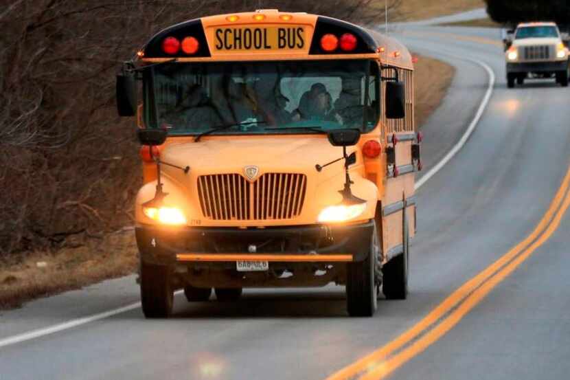 Several students and a coach were injured Saturday when a car and their school bus collided...