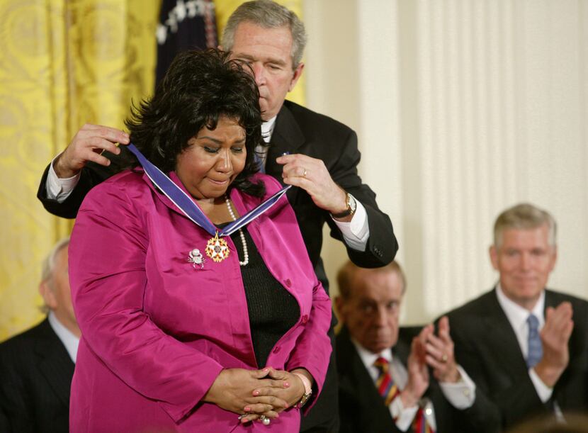 President George W. Bush presents Aretha Franklin with the Presidential Medal of Freedom,...
