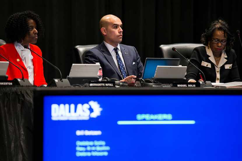 DISD trustees (from  left) Bernadette Nutall, Miguel Solis and Joyce Foreman listened to...