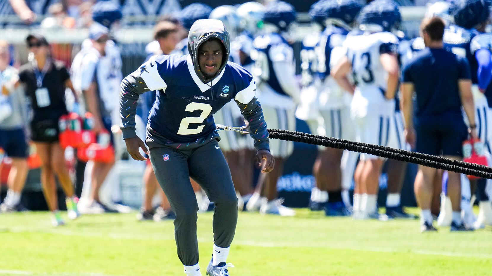 Dallas Cowboys cornerback Jourdan Lewis works on the side with a resistance band during a...