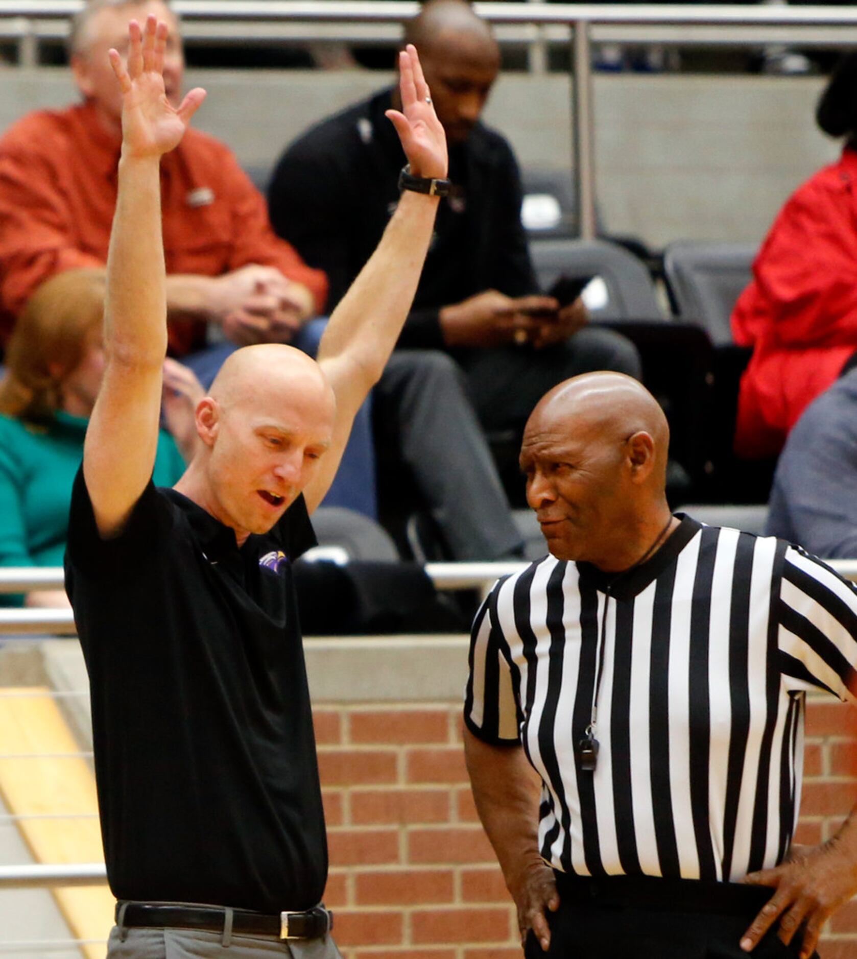 Richardson head coach Kevin Lawson questions a game official about a defensive foul called...