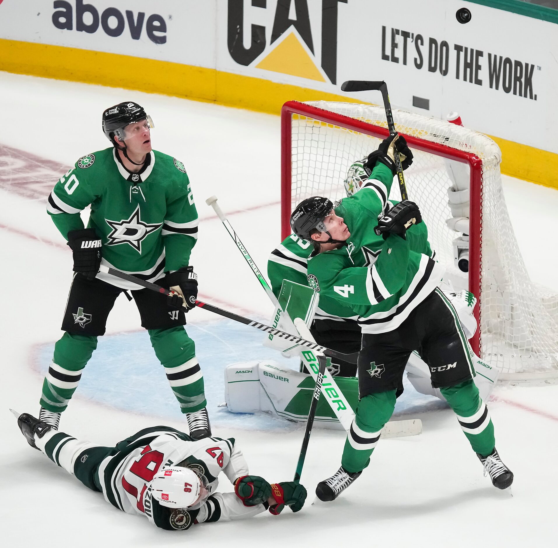 Dallas Stars defenseman Miro Heiskanen (4) reaches for a high rebound after goaltender Jake...