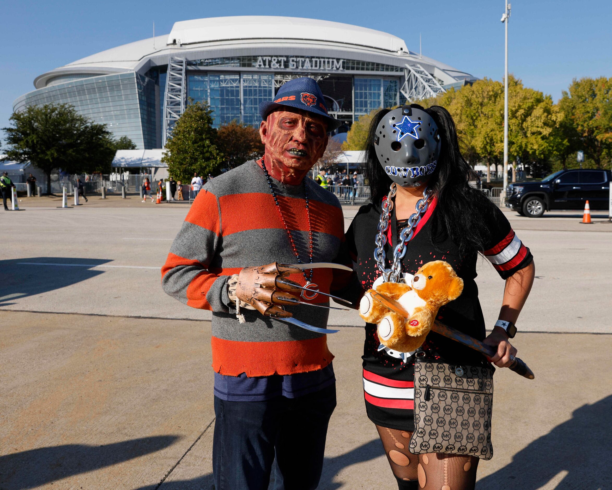 Walter Santoyo, 48 (left), and Laura Santoyo, 41, of Chicago, show off their Halloween...