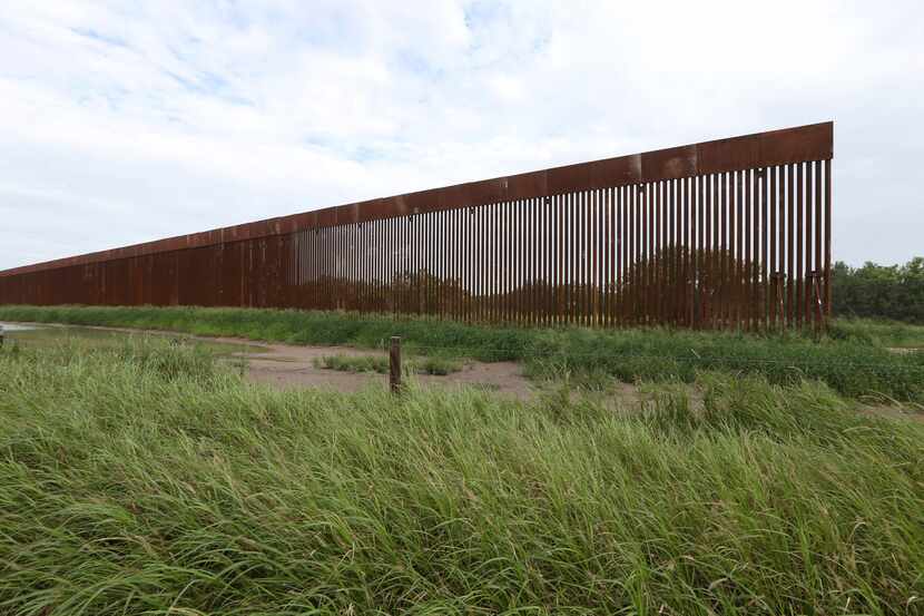 FILE - A border wall section stands on July 14, 2021, near La Grulla, Texas, in Starr...