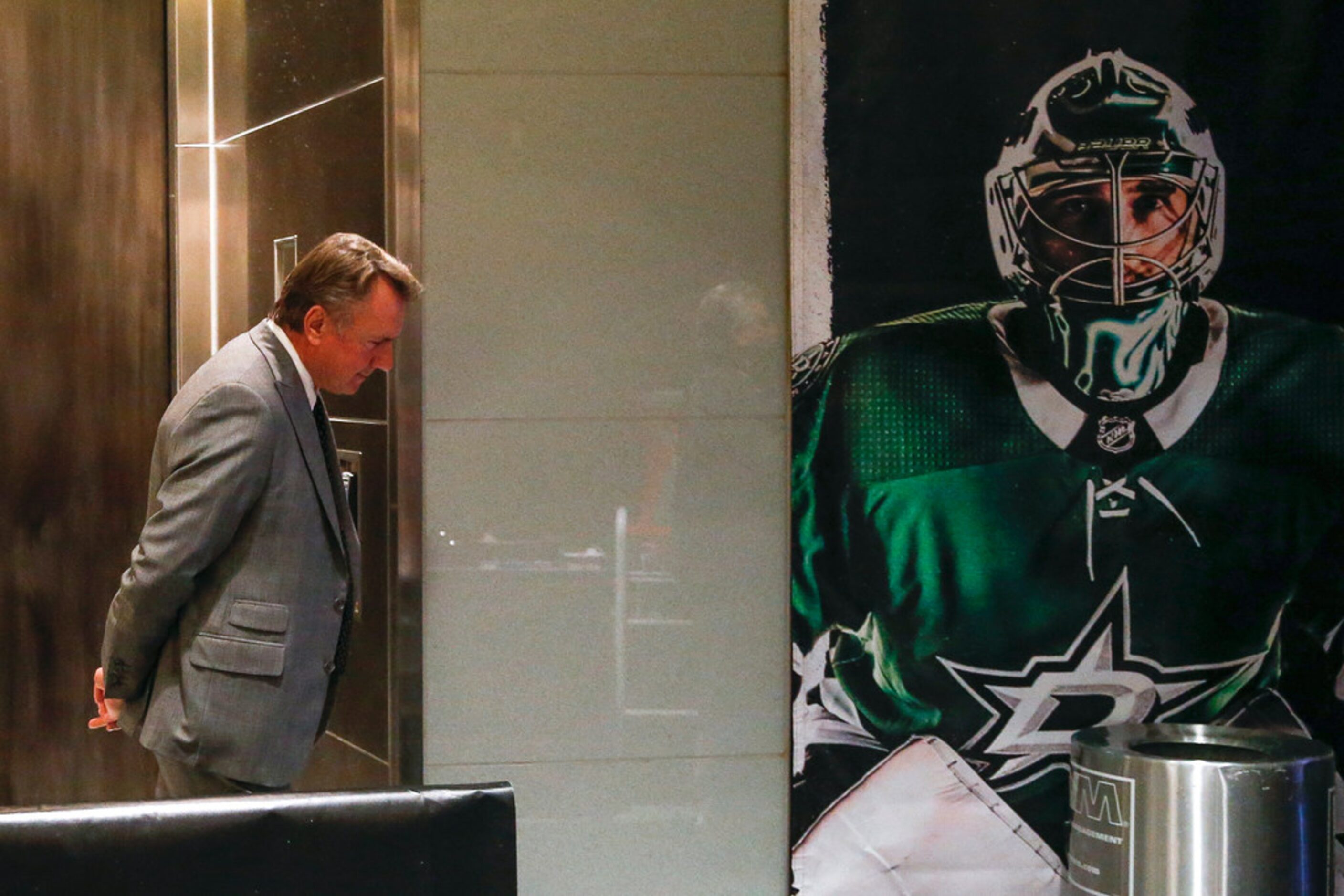 Dallas Stars interim head coach Rick Bowness takes a moment to himself prior to heading to...