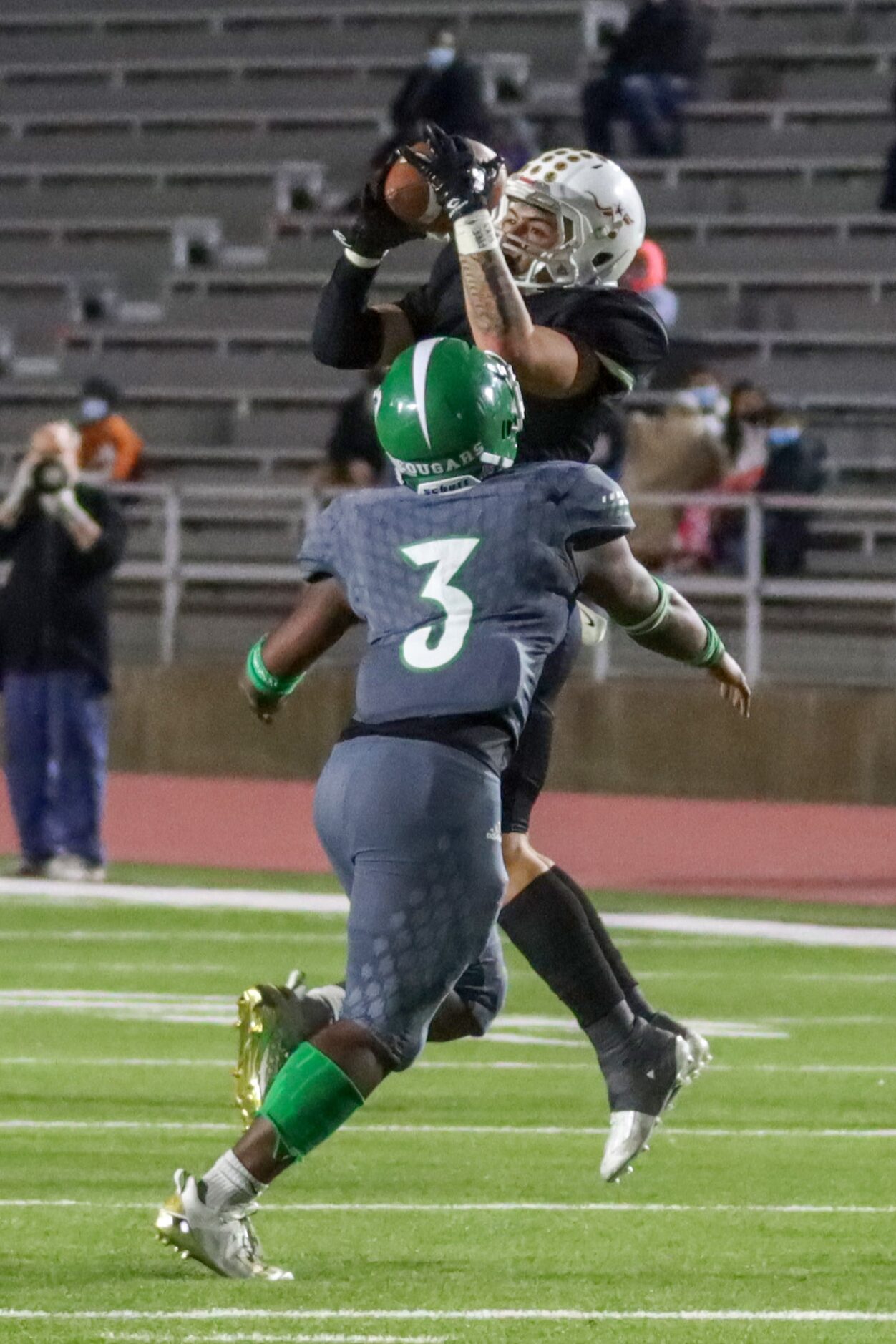 W.T. White linebacker Jordan Ramirez (4) intercepts the ball over Bryan Adams running back...