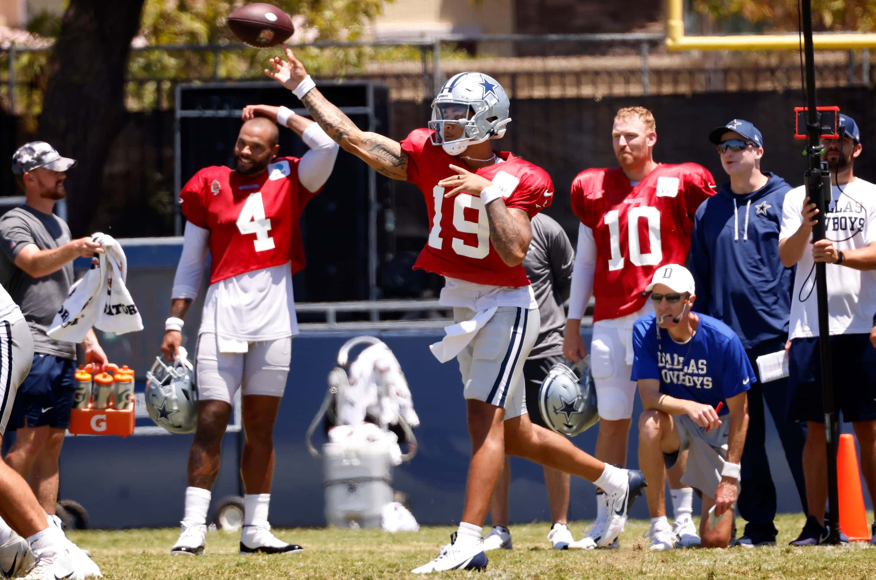Dallas Cowboys quarterback Trey Lance (19) fires a pass as the offenss faced the defense...