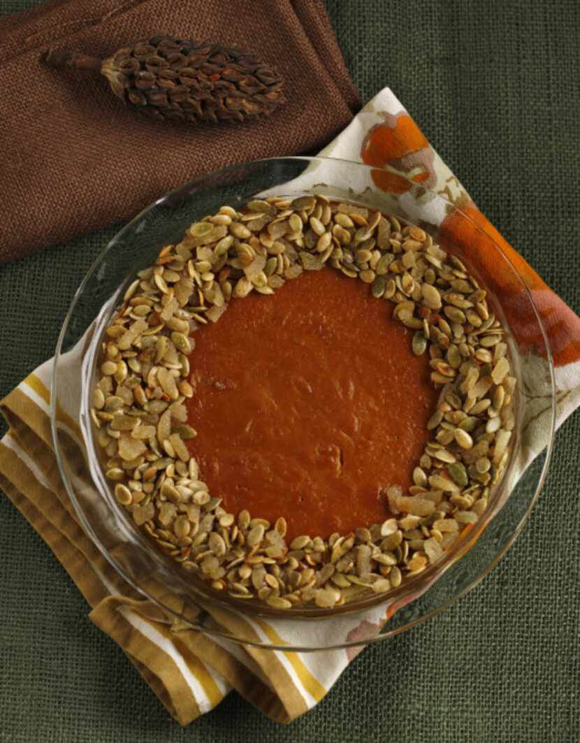 Pump up the traditional pumpkin pie with  Gingersnap Pumpkin Pie With Candied Pumpkin Seeds.