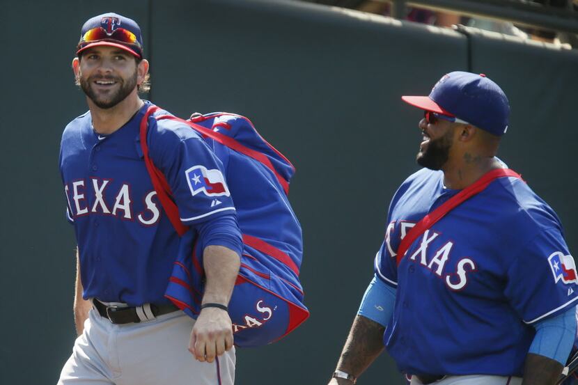 Texas first basemen Mitch Moreland, left, and Prince Fielder are pictured during the Kansas...
