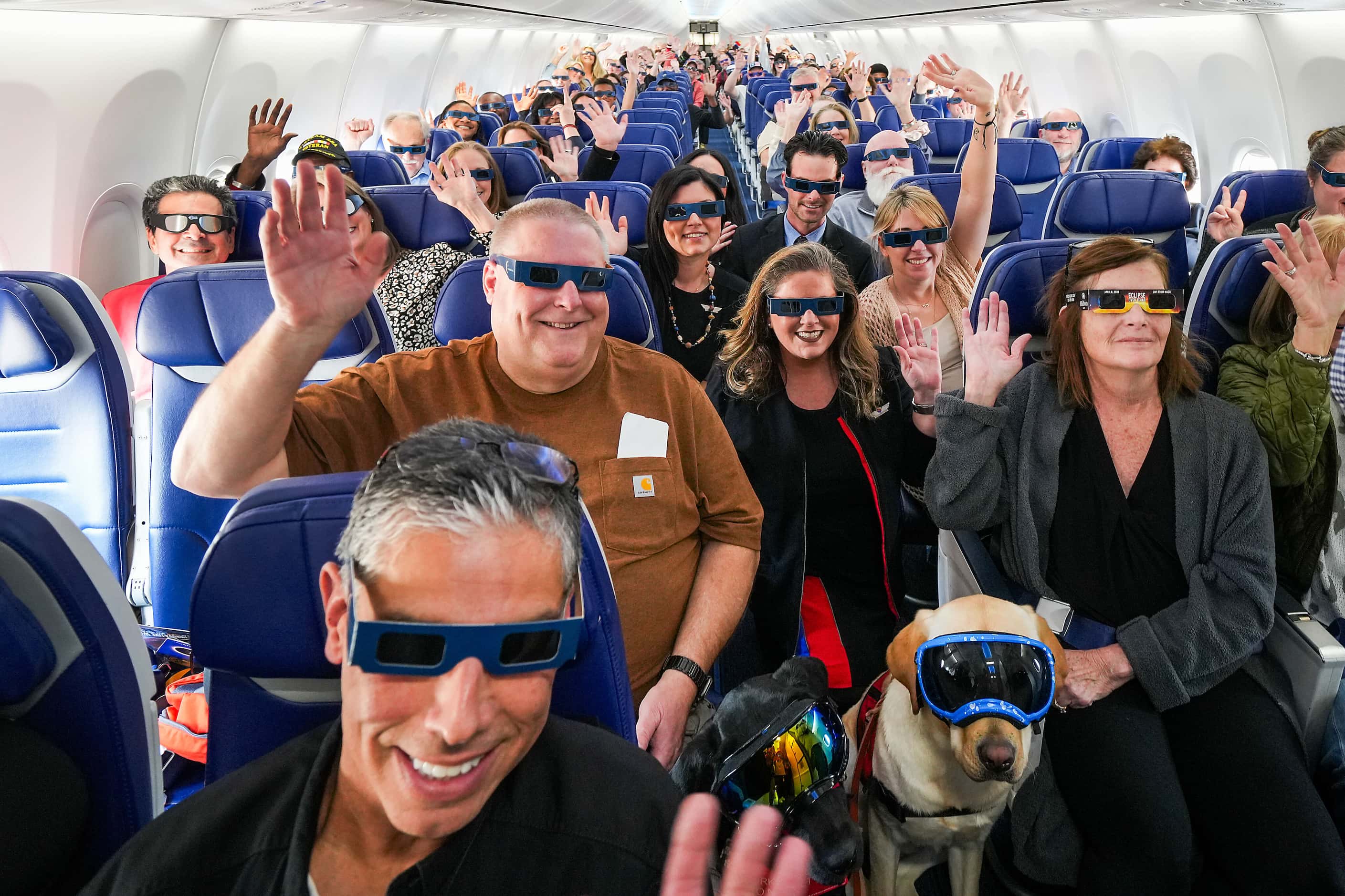 Passengers and crew onboard Southwest flight #1252 from Dallas to Pittsburgh pose for a...
