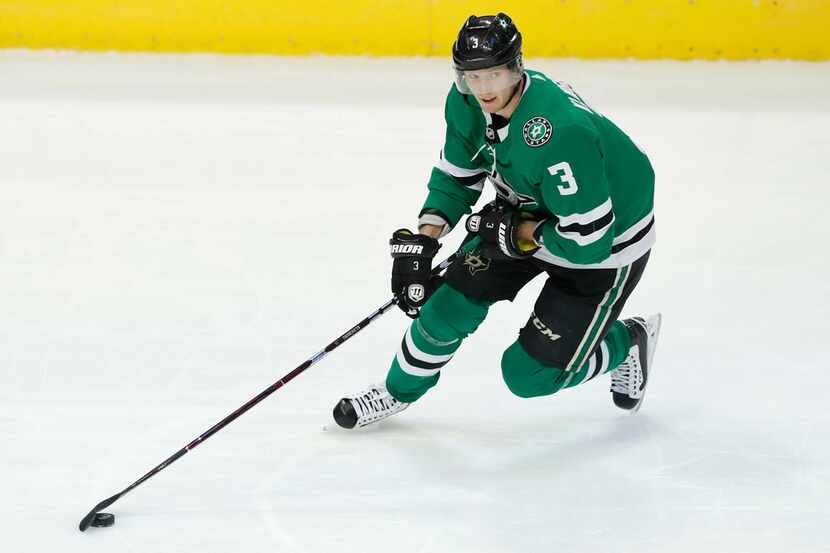 Dallas Stars defenseman John Klingberg (3) skates with the puck during the second period of...