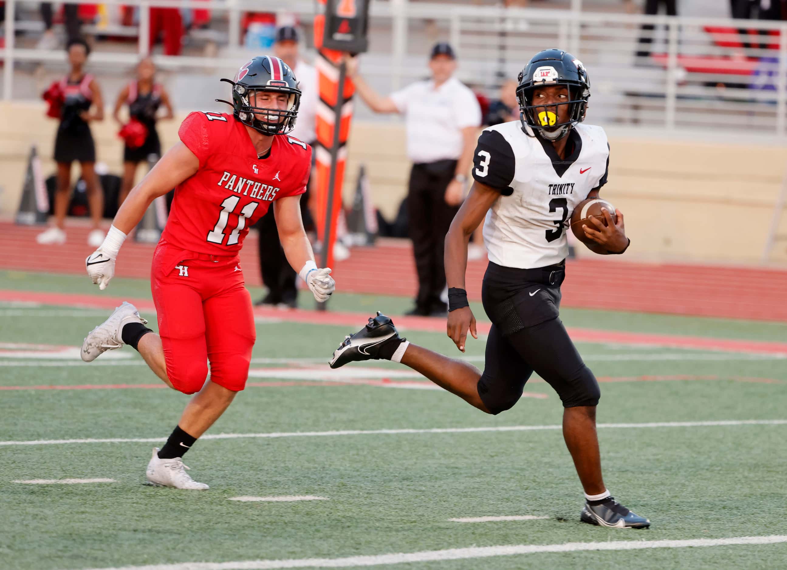 Trinity running back Gary Maddox (3) scores a rushing touchdown in front of Colleyville...