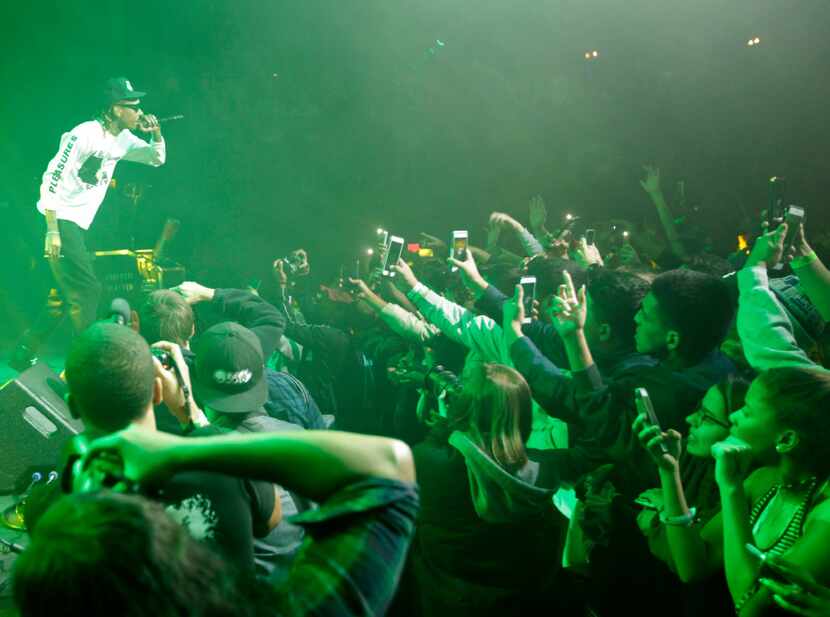 It was a sea of phones close to the stage at the Wiz Khalifa show at the Bomb Factory in...