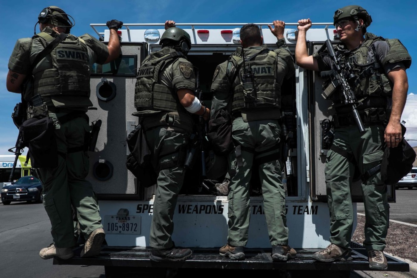 Law enforcement agents respond to an active shooter at a Wal-Mart near Cielo Vista Mall in...