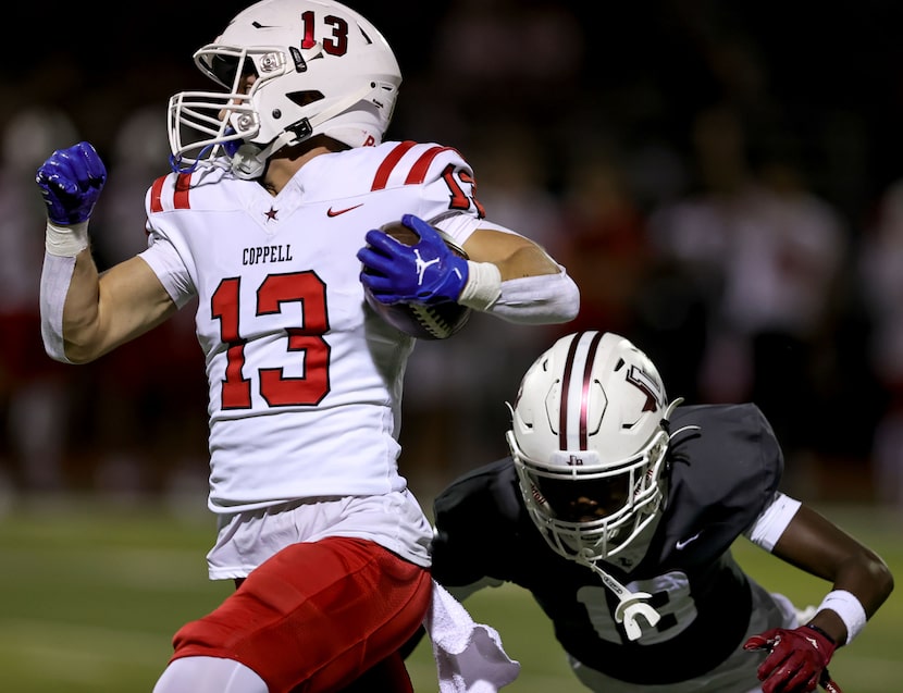 Coppell wide receiver Harry Hassmann (13) gets past Lewisville defensive back Deontae...