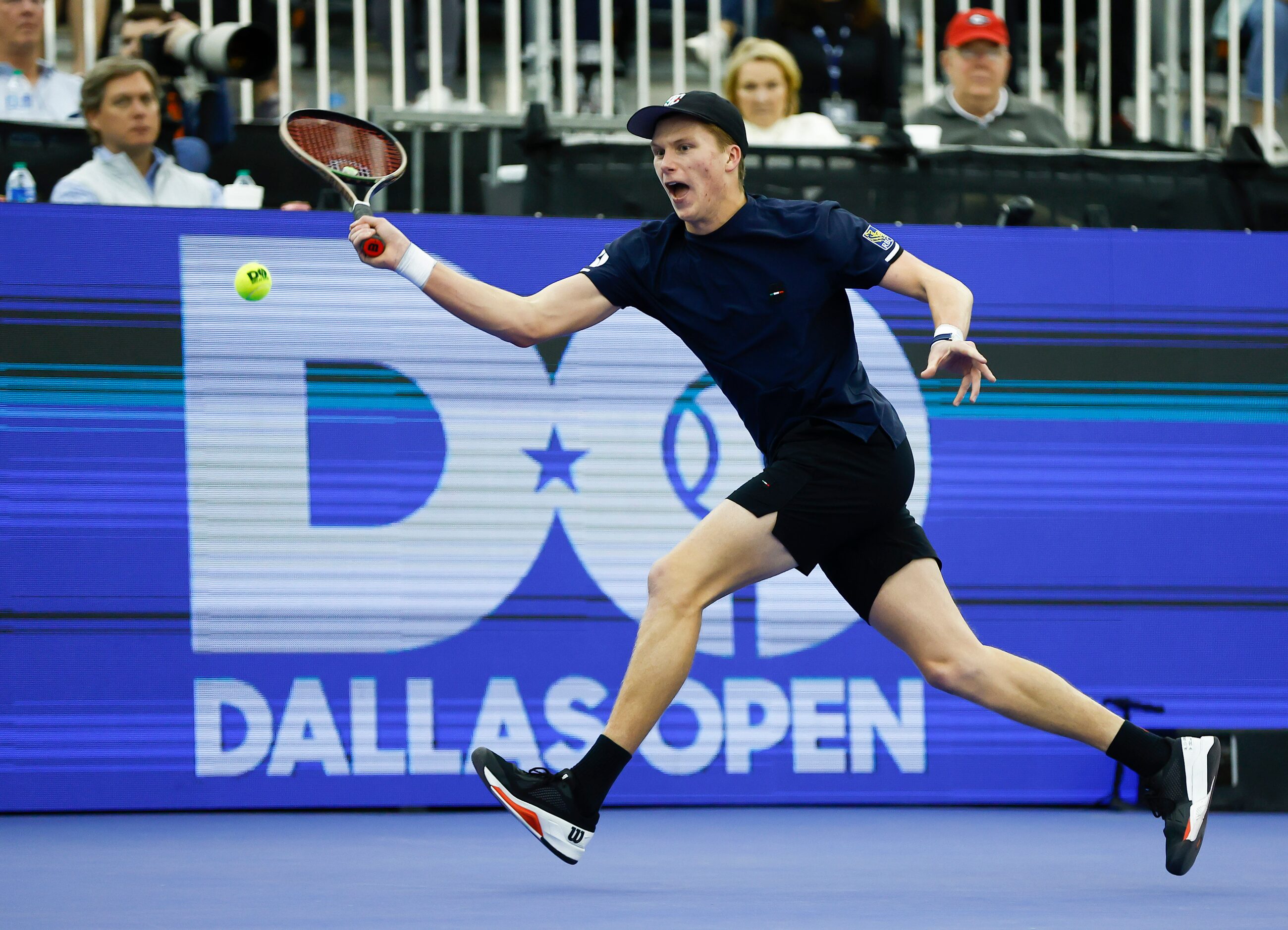 Jenson Brooksby returns the ball during the finals of the ATP Dallas Open against Reilly...