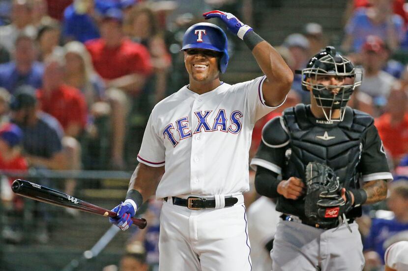 Texas Rangers designated hitter Adrian Beltre (29) smiles after talking with home plate...