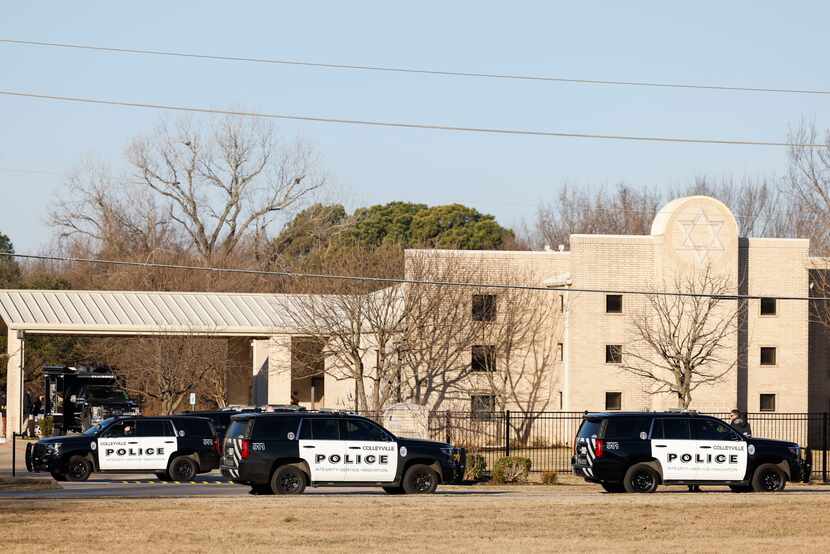 Authorities remained at Congregation Beth Israel on Sunday, a day after an 11-hour standoff...